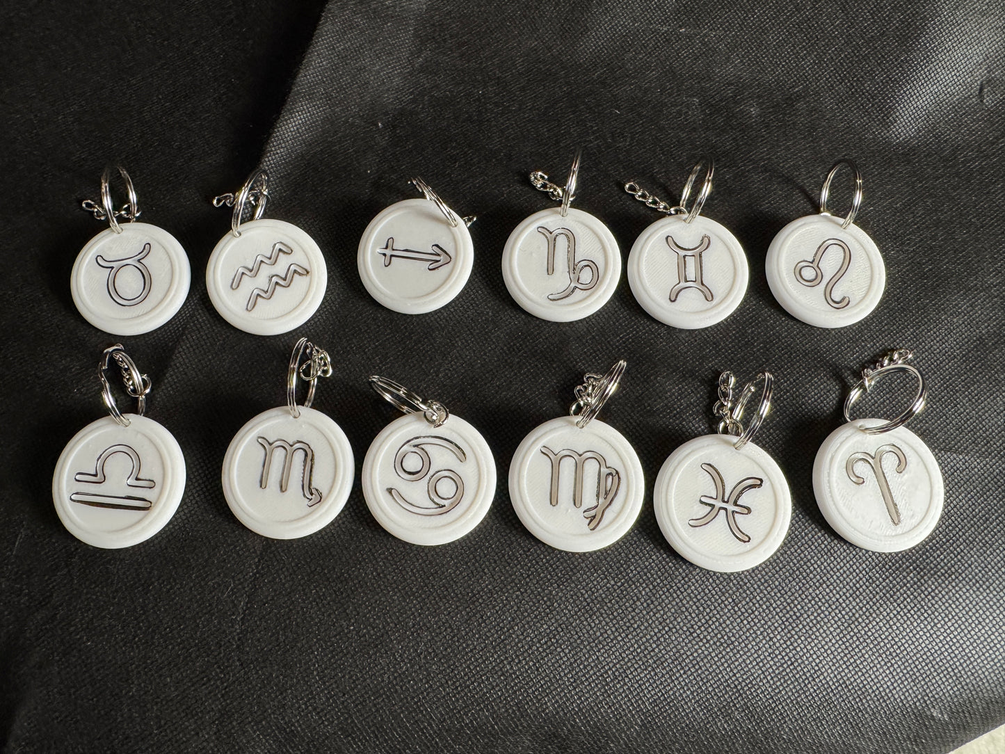 Zodiac Sign Keychains โ Hand-Painted 3D Printed Cosmic Symbols