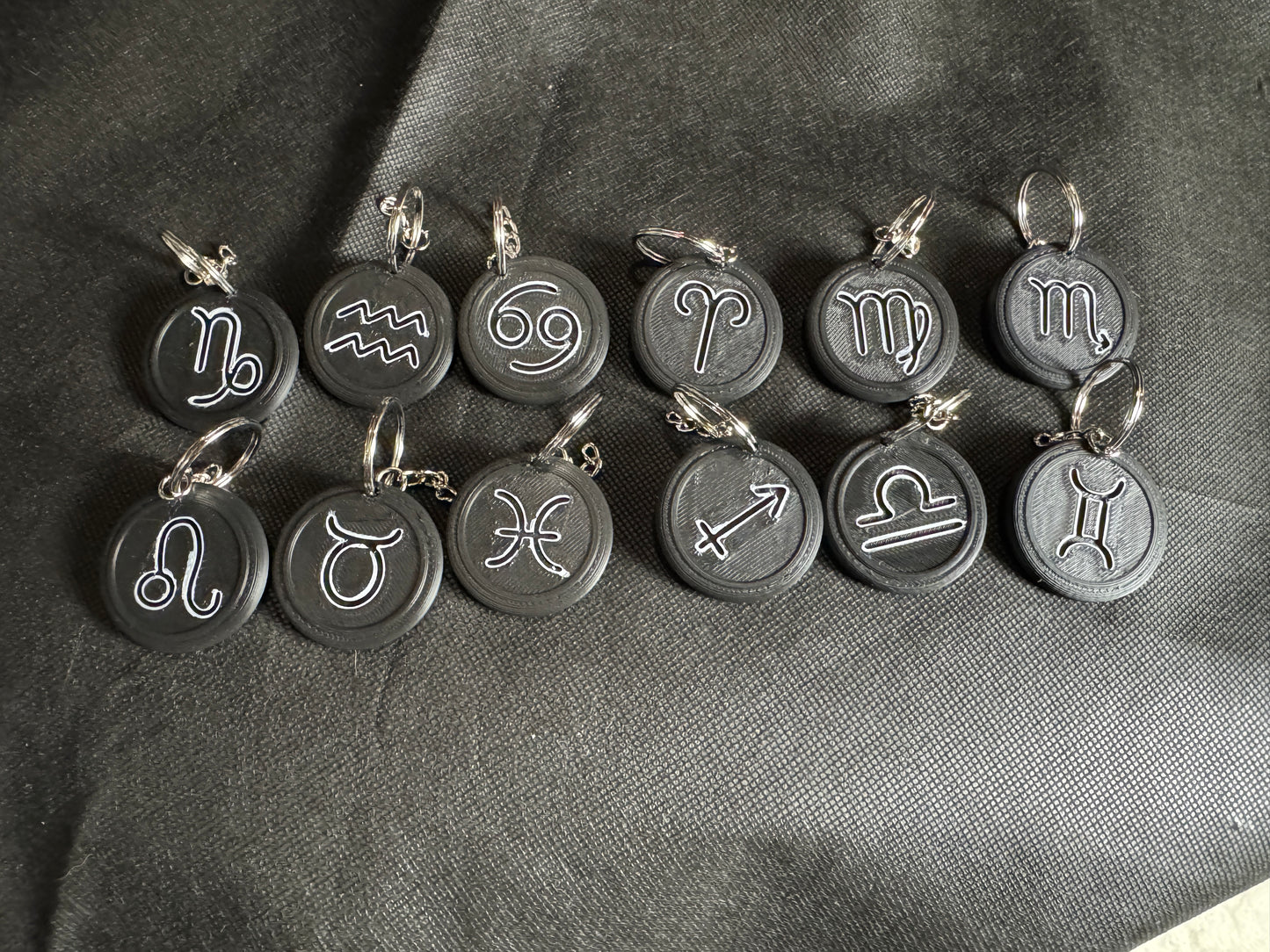 Zodiac Sign Keychains โ Hand-Painted 3D Printed Cosmic Symbols